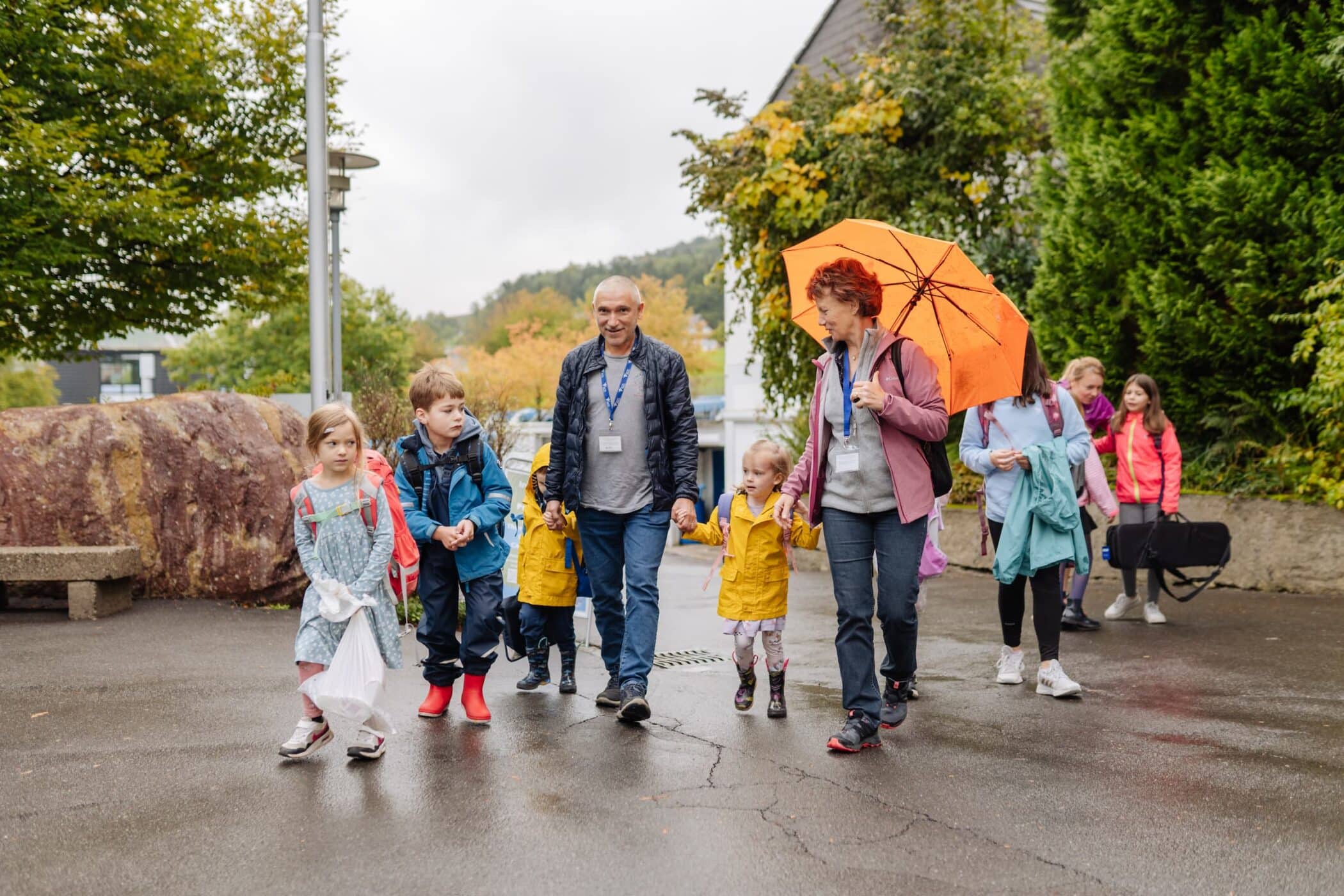 Family arriving at ISZL for a community event