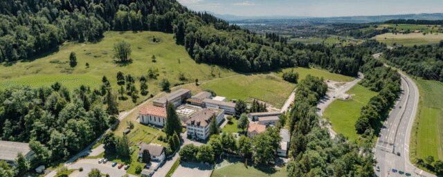 Aerial view of ISZL’s Zug Campus in Baar, showcasing the welcoming environment of our International English School in Switzerland.