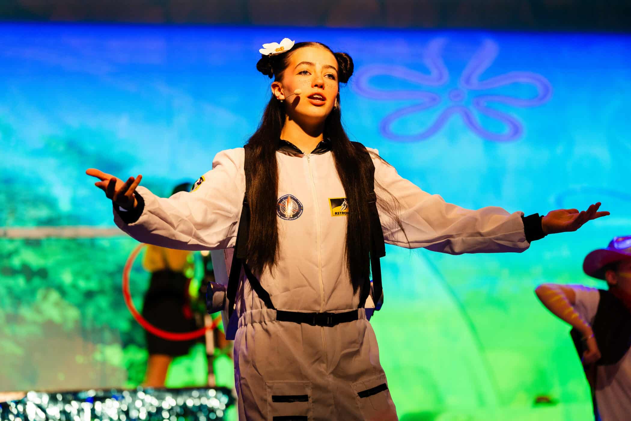 middle school student performing in drama