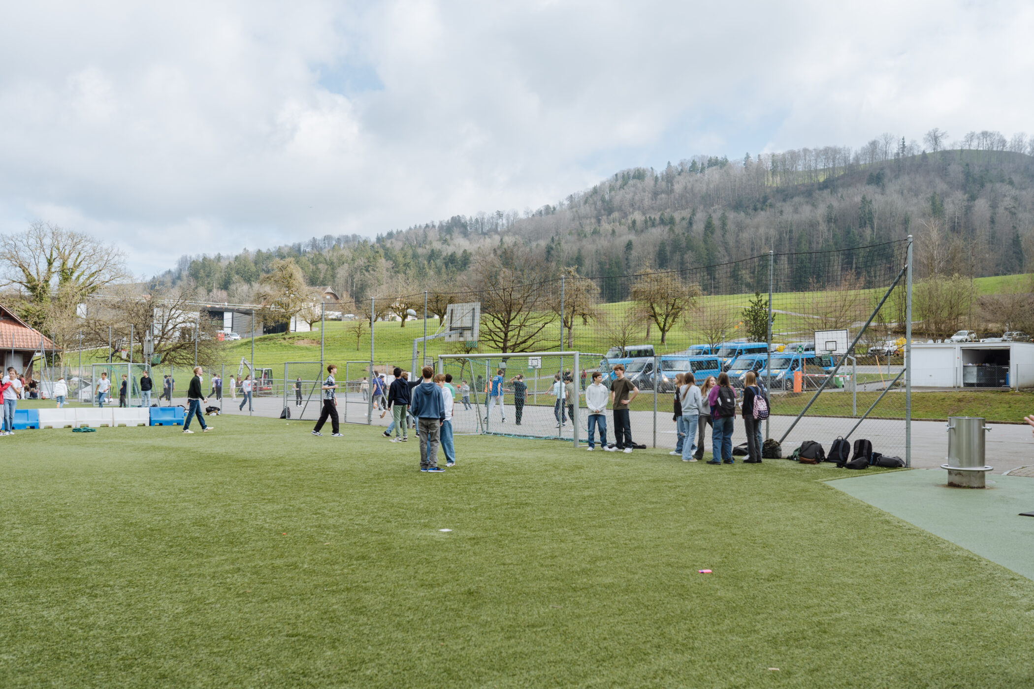 playing field with hills in the background