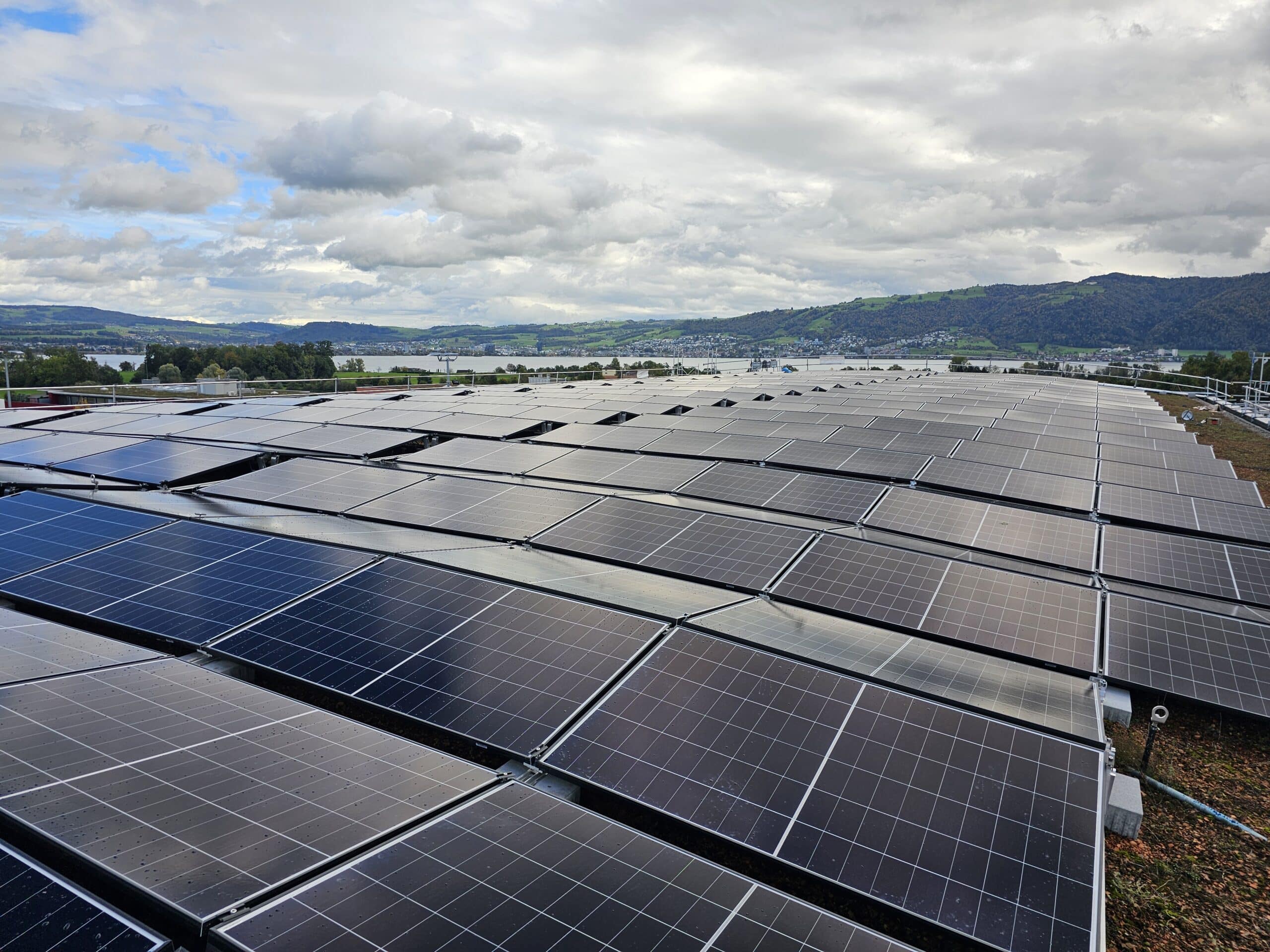 Solar panels installed on the gymnasium roof as part of a student-driven sustainability project at ISZL.