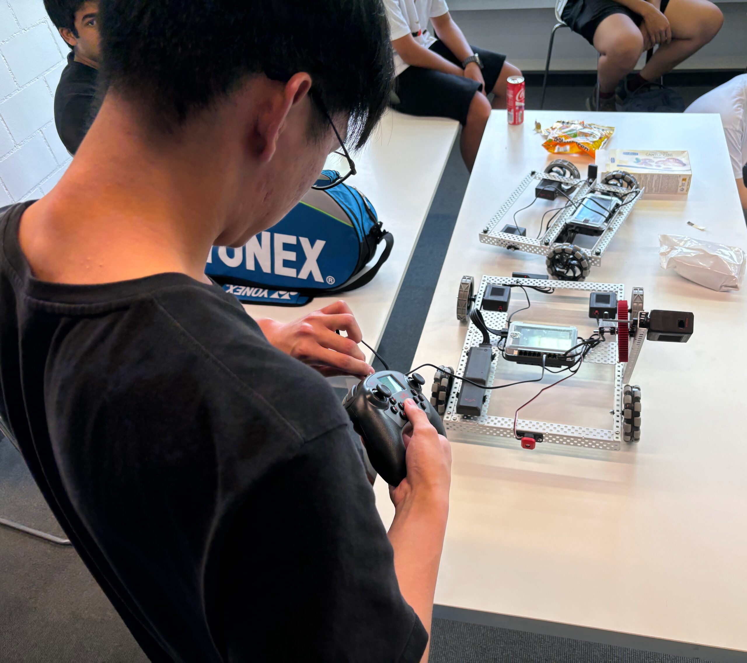 student building robotics
