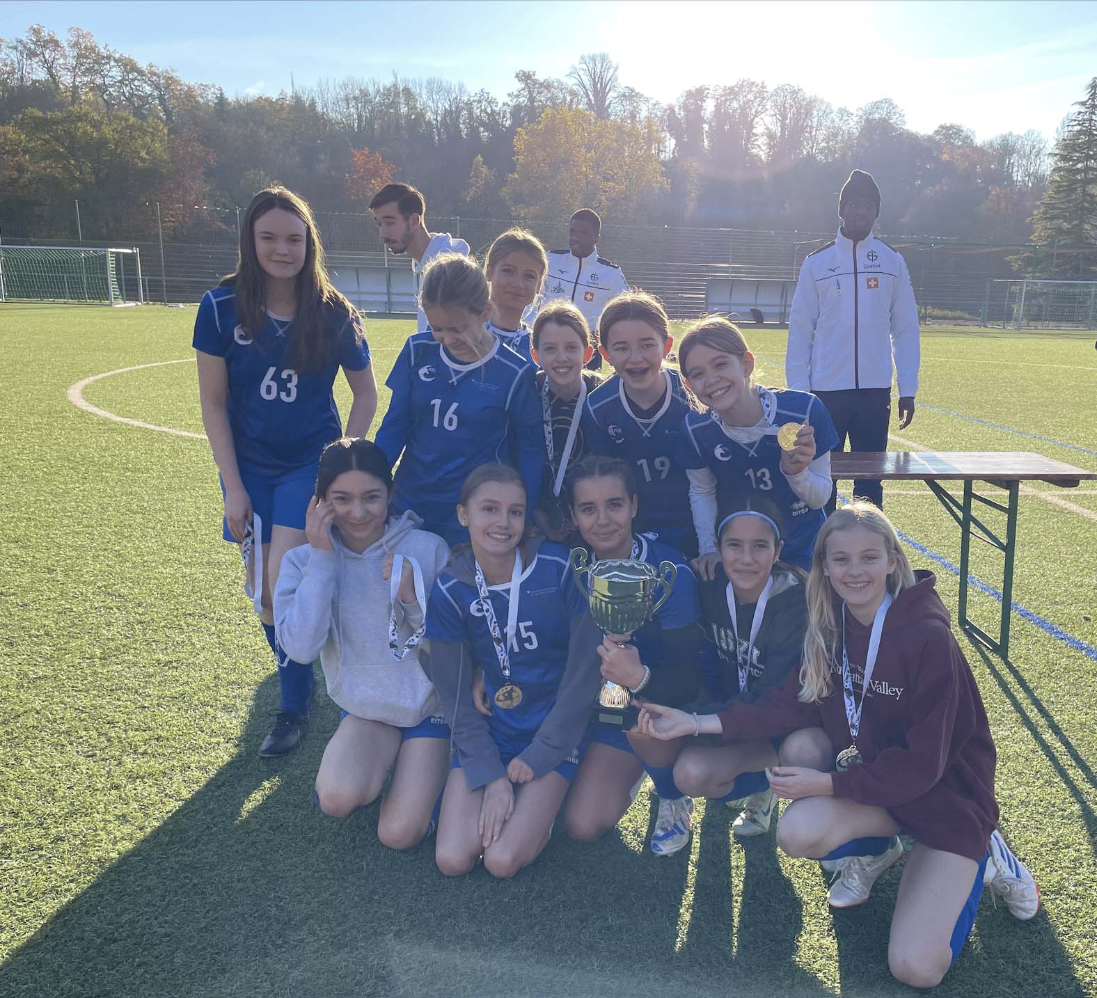 football girls with trophy