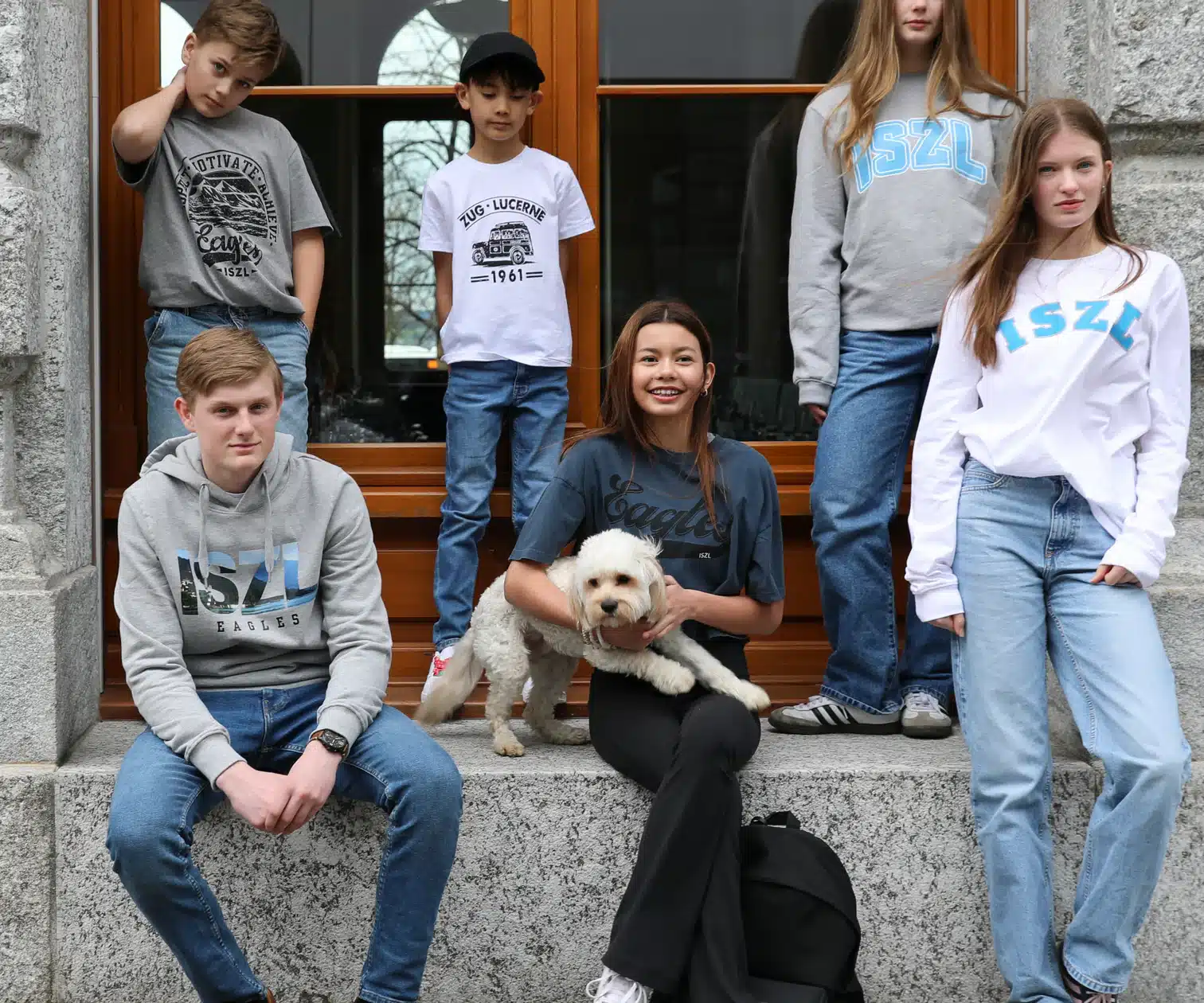 students wearing official ISZL merchandise
