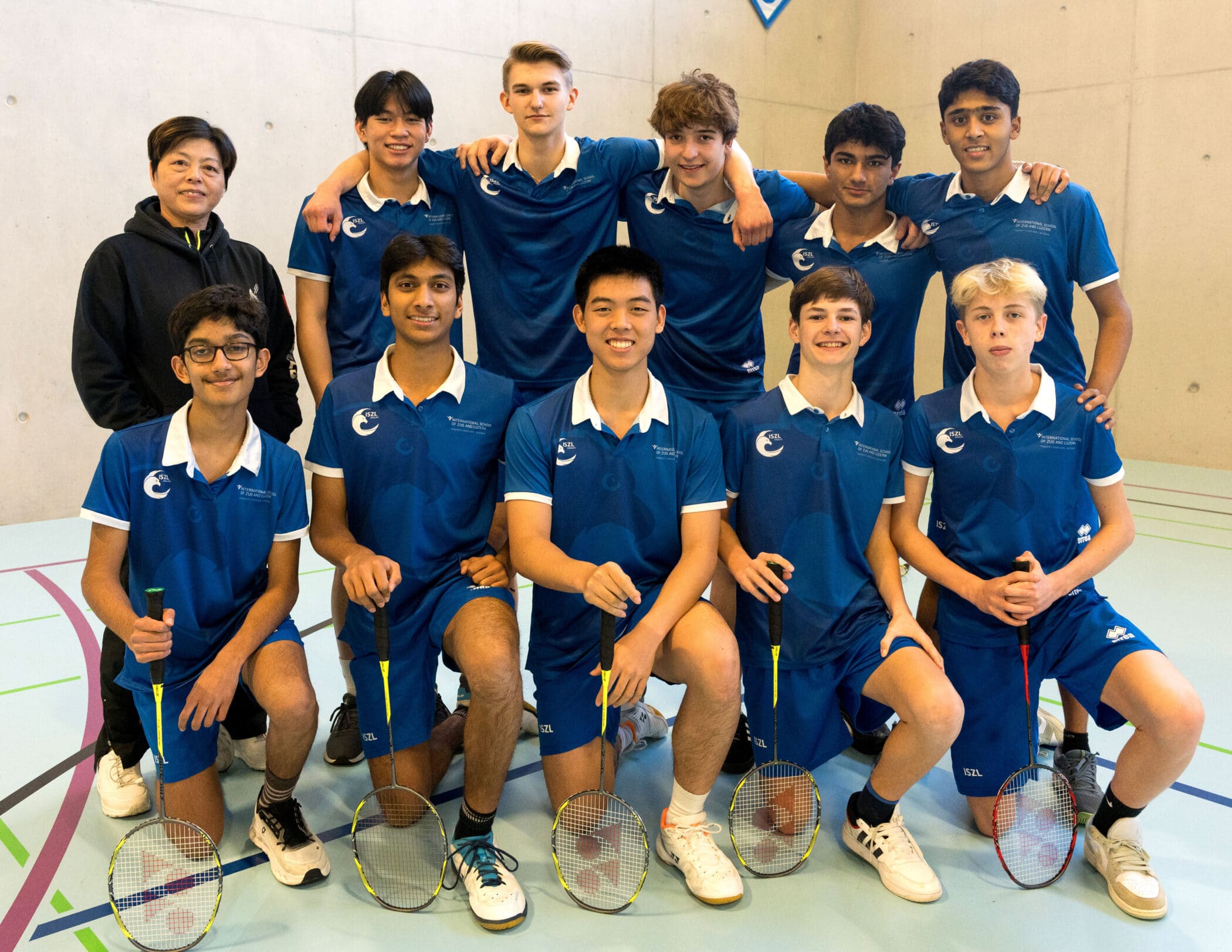 High School badminton players team photo