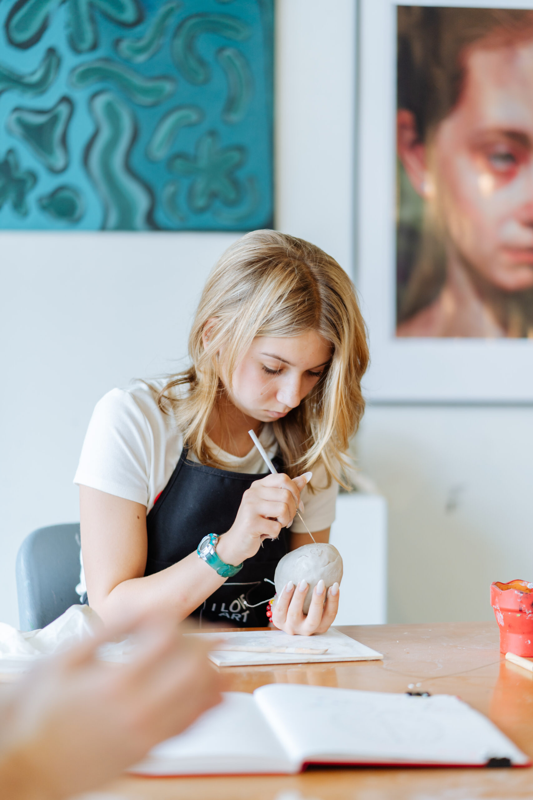 student making artwork