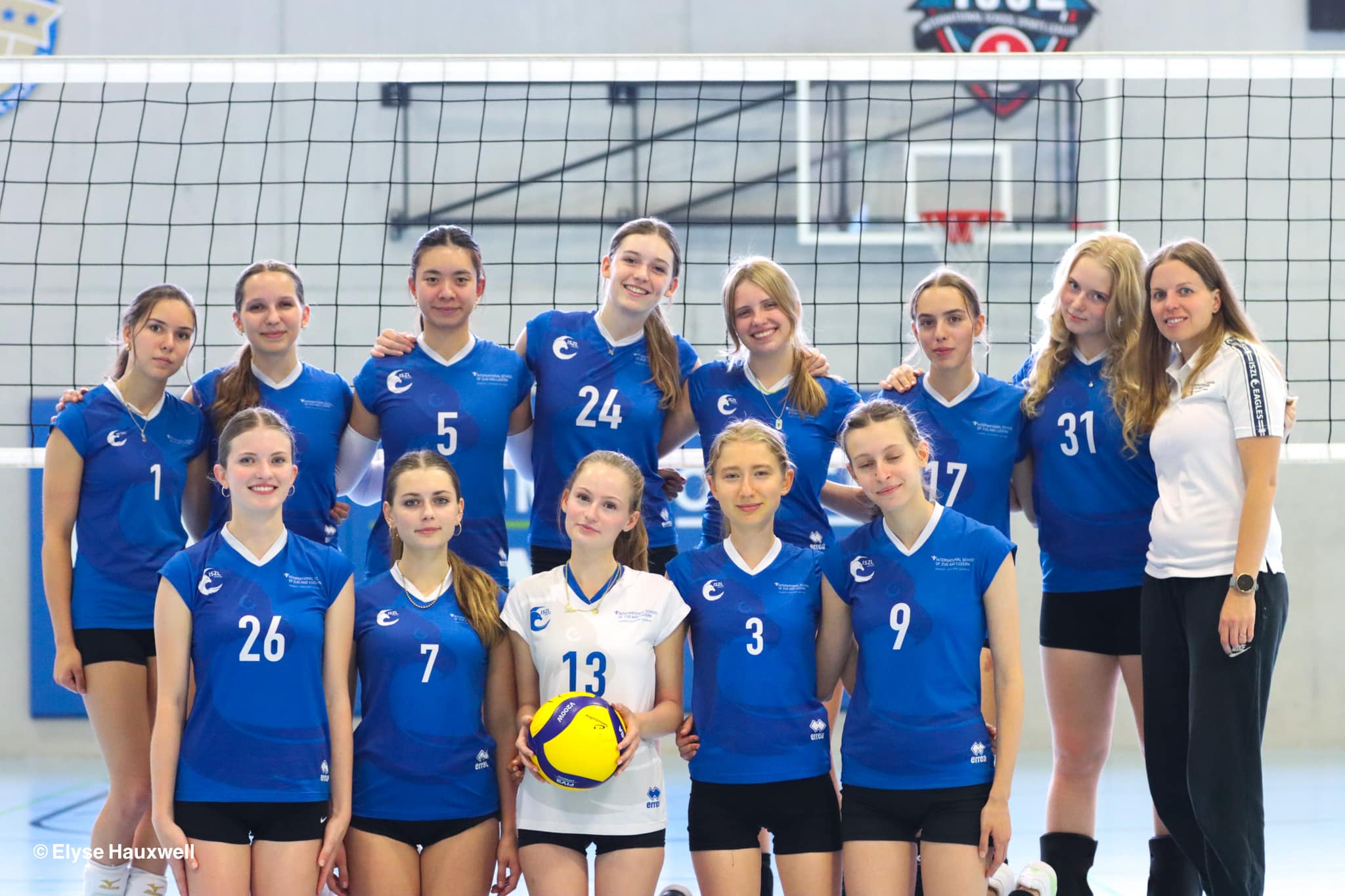 High School female basketball team competing in a game at ISZL.