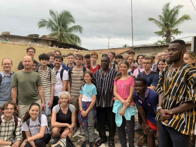 students in Ghana helping build a school with FFE funds