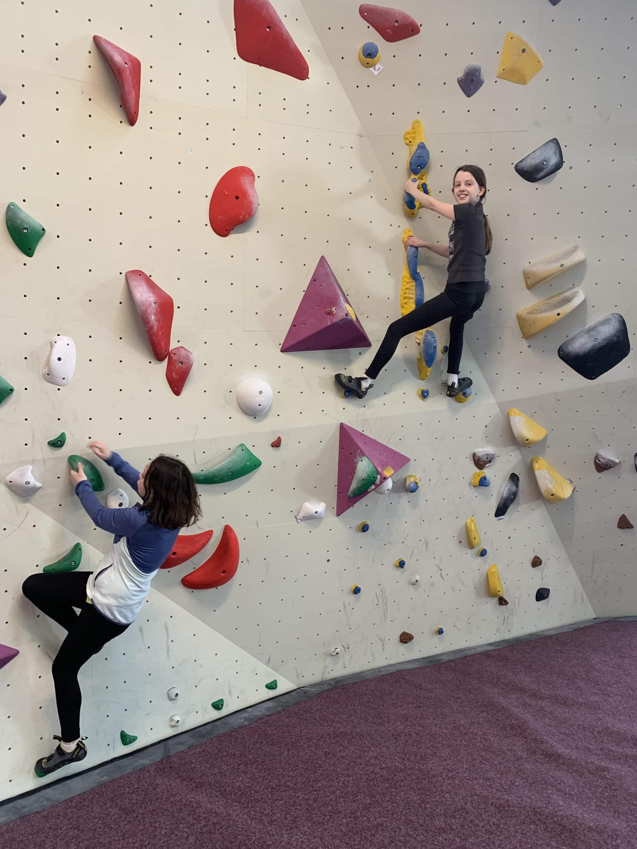 bouldering club students climbing