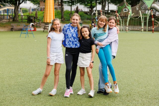 group of primary school students outside playing