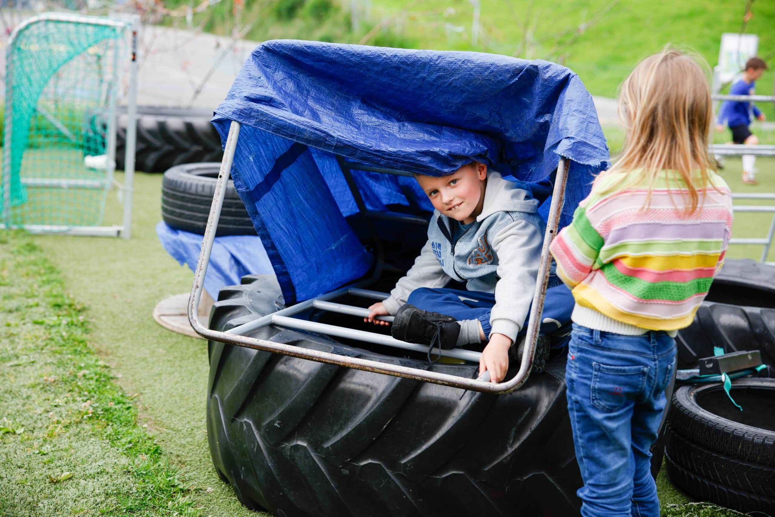 a young student taking risks in the playground