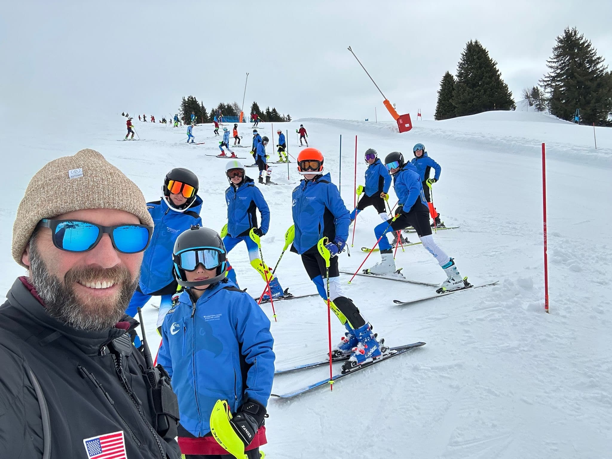 ISZL high school students on a snowy mountain slope