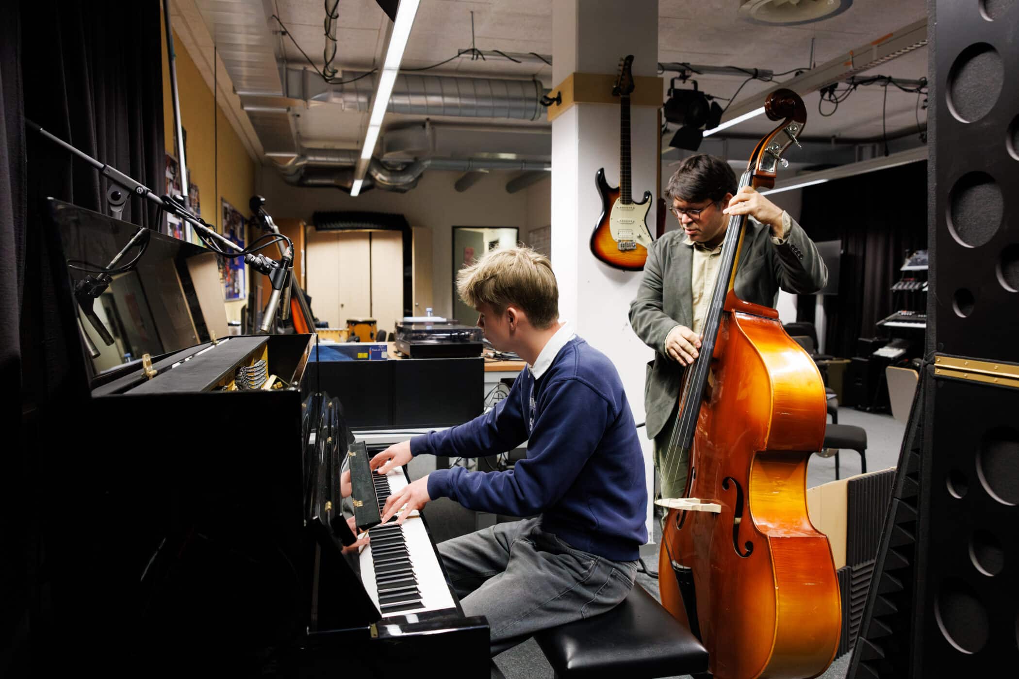 high school student playing piano