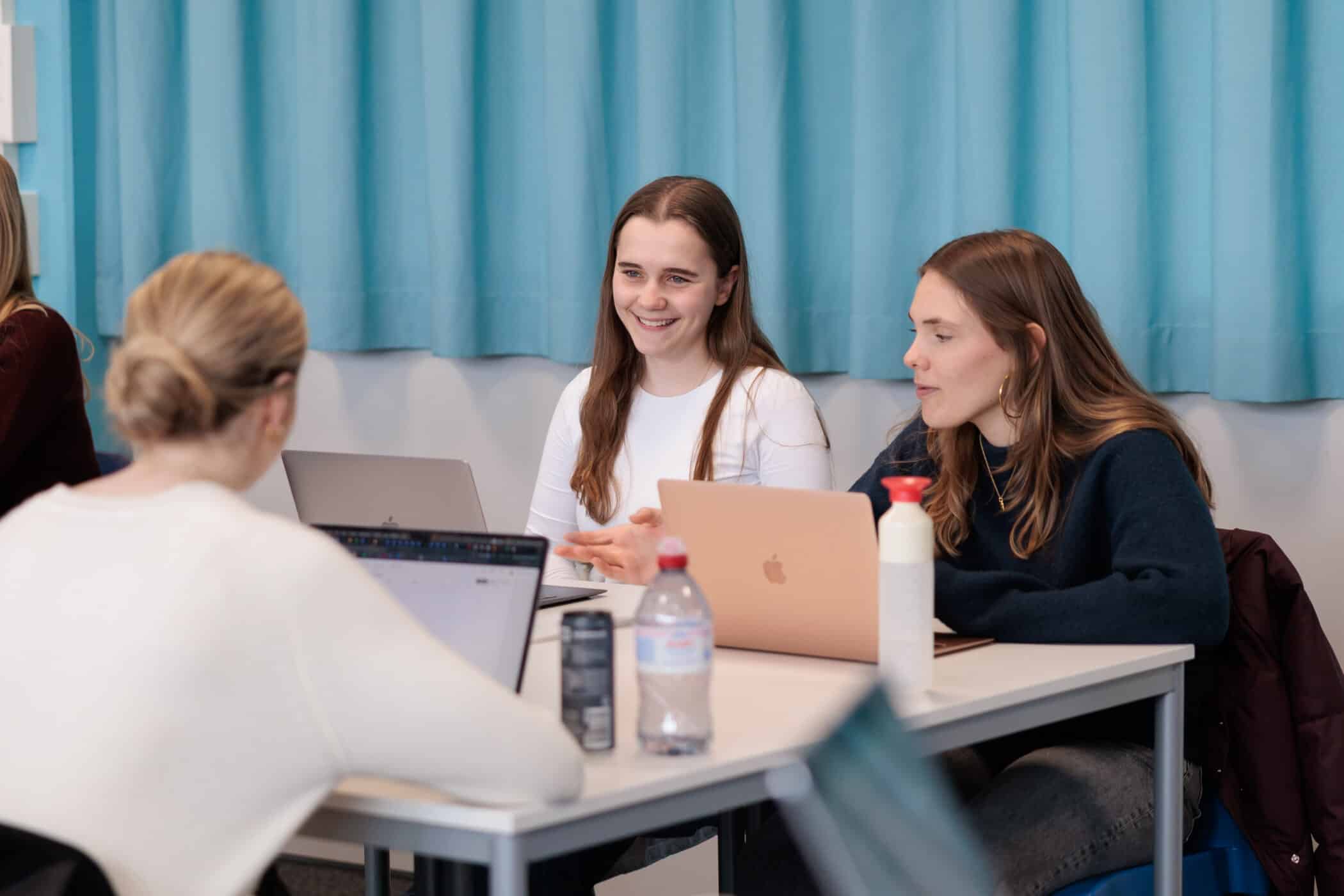 high school girls working together
