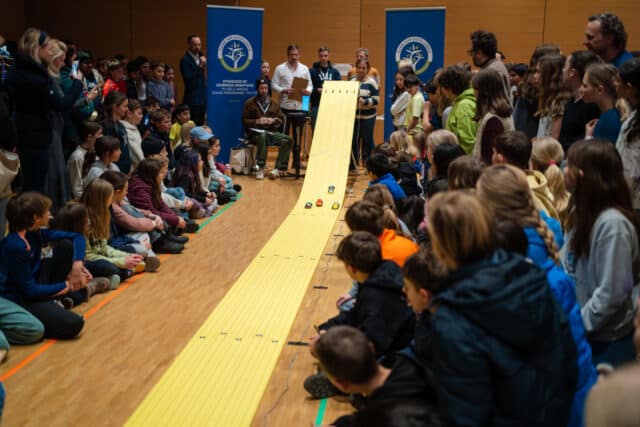 students watching at the FFE Pinewood derby