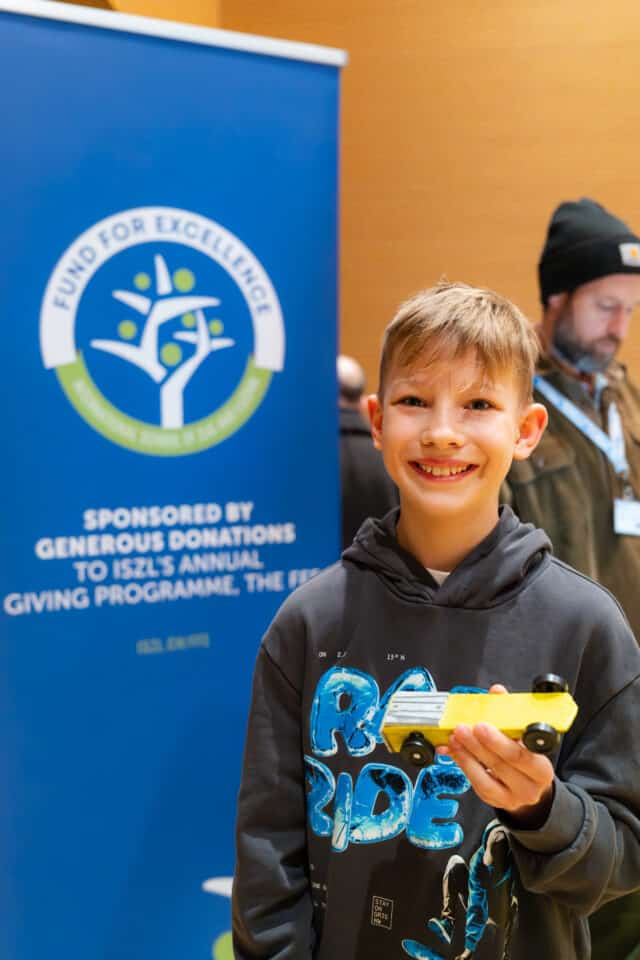 G6 student with his handmade model racing car