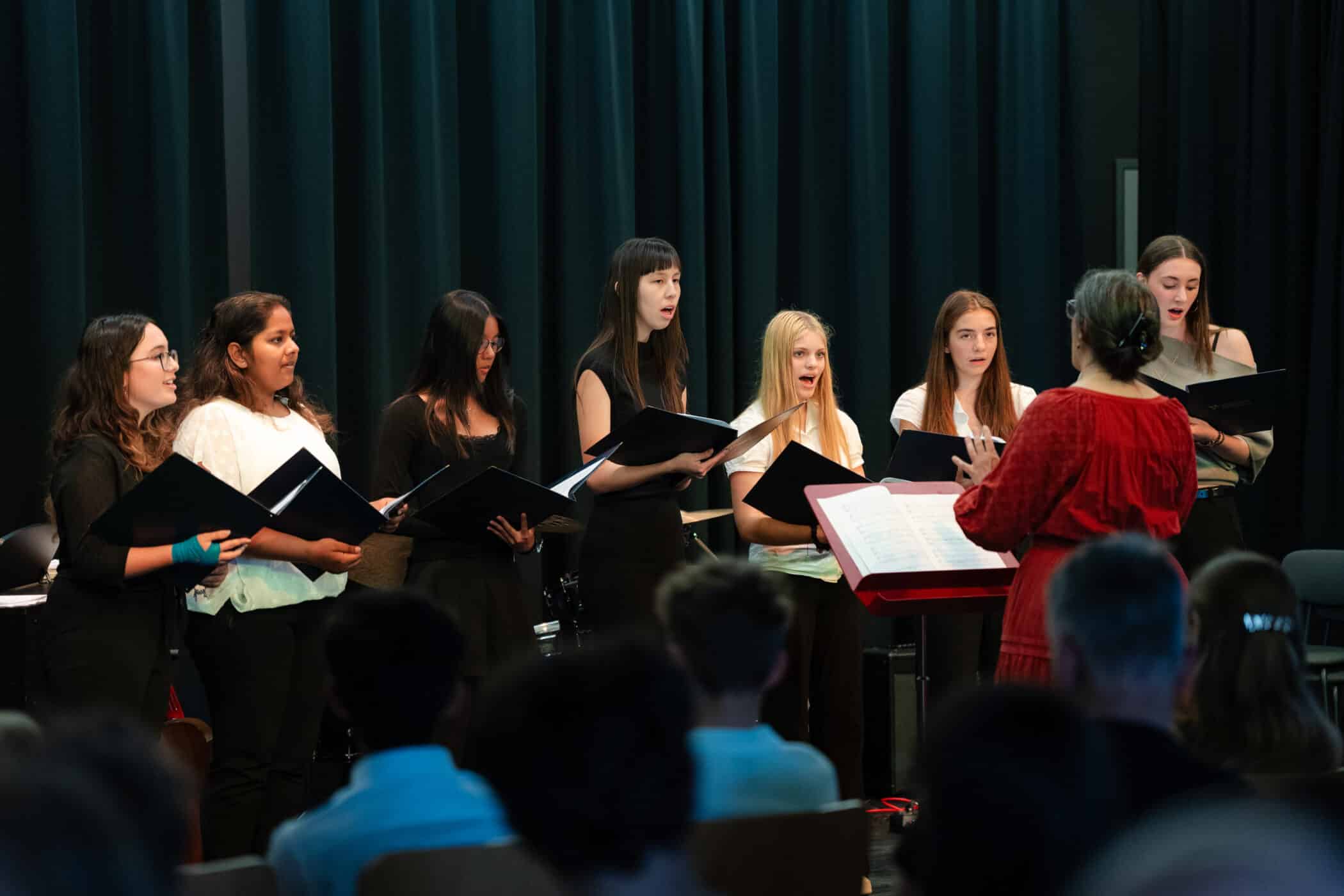 high school students singing