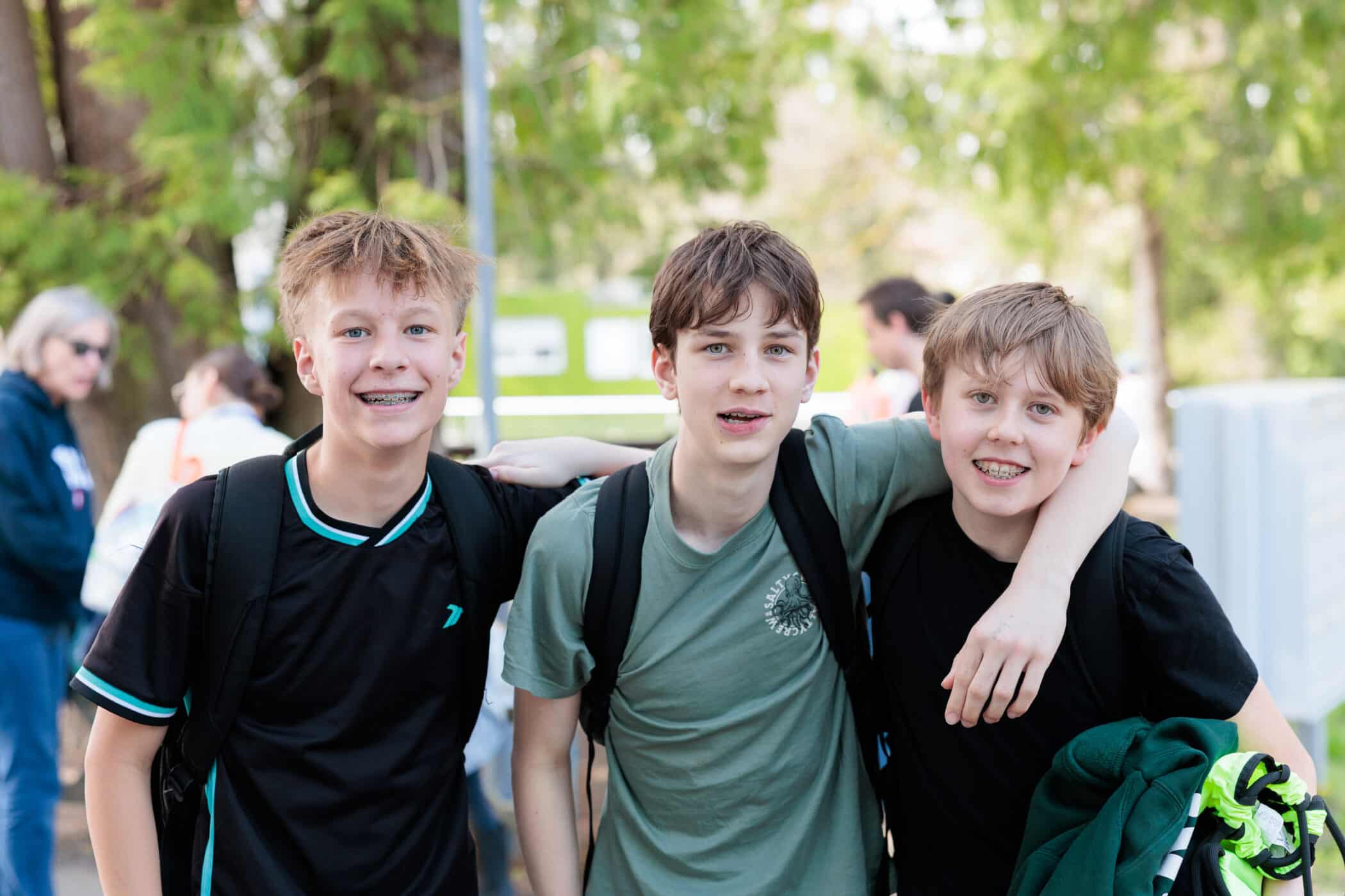middle school students laughing together