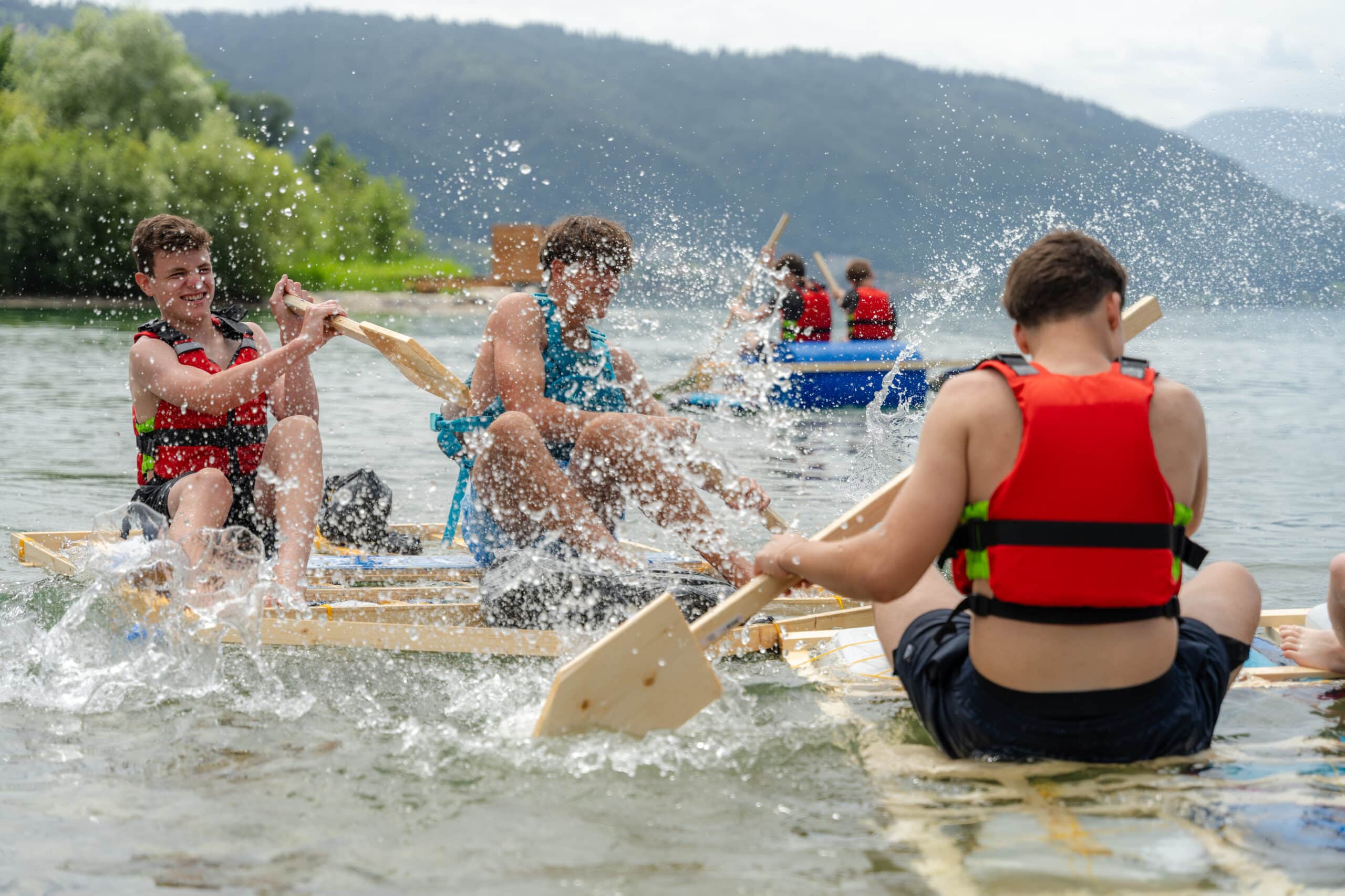 grade 8 male students in home made rafts